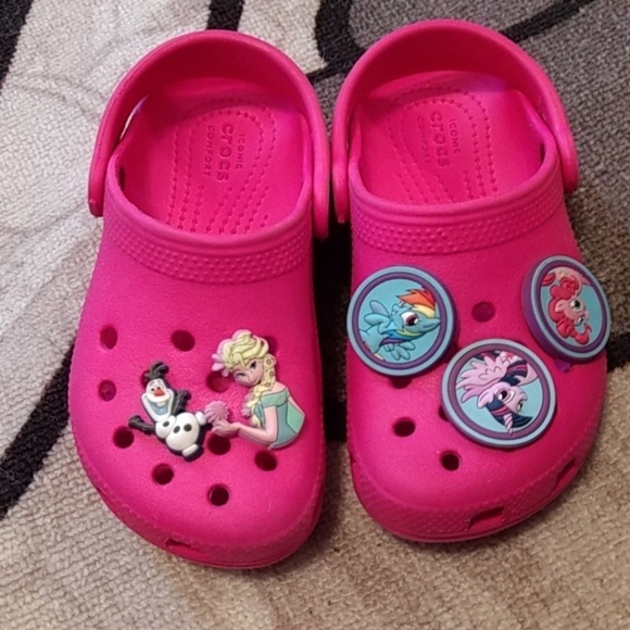 pink crocs with charms